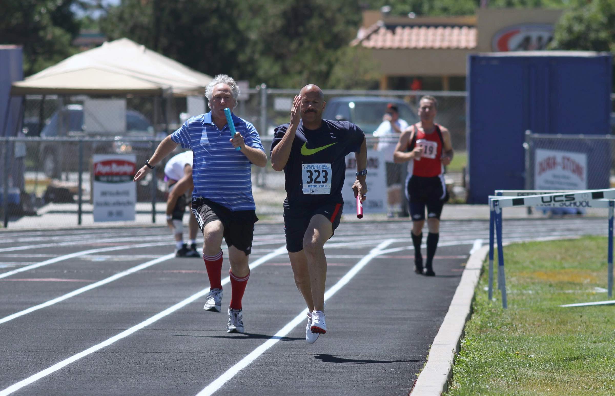 Reno Event Photography, photographer, track & field, relay, Reno Nevada.